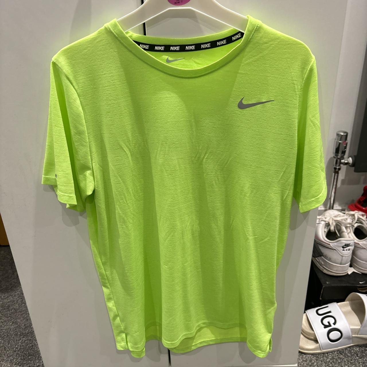 barely green nike shirt