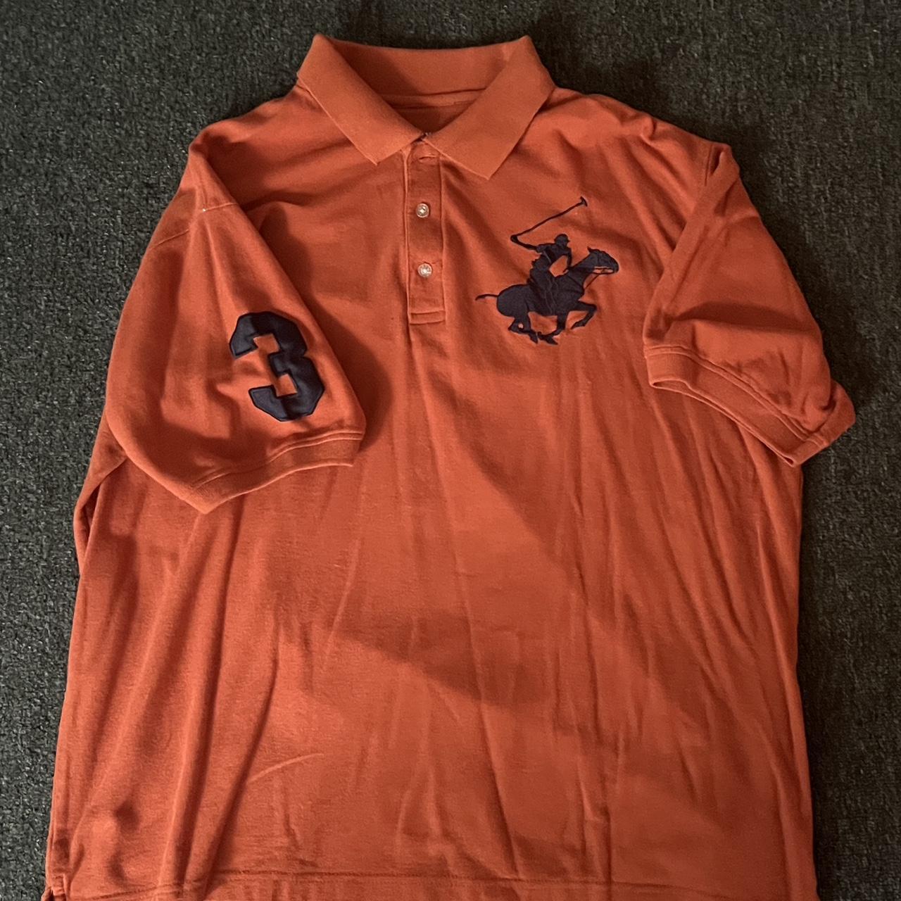 Black polo shirt with orange horse hotsell