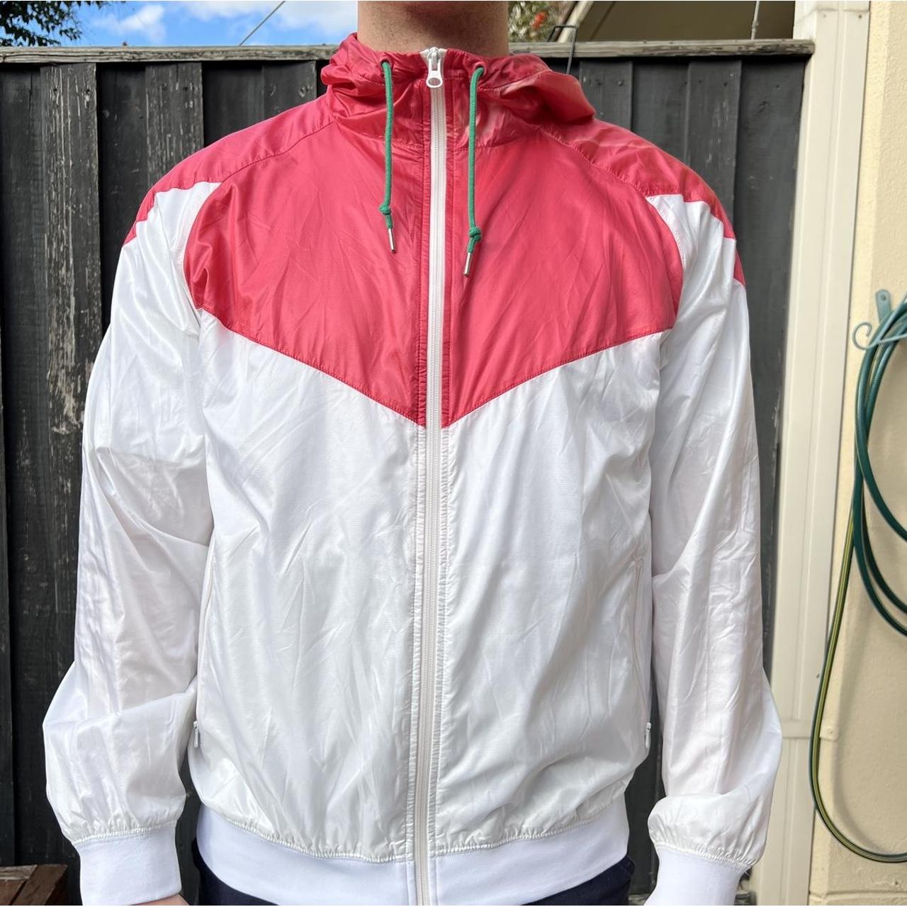 pink and white nike jacket