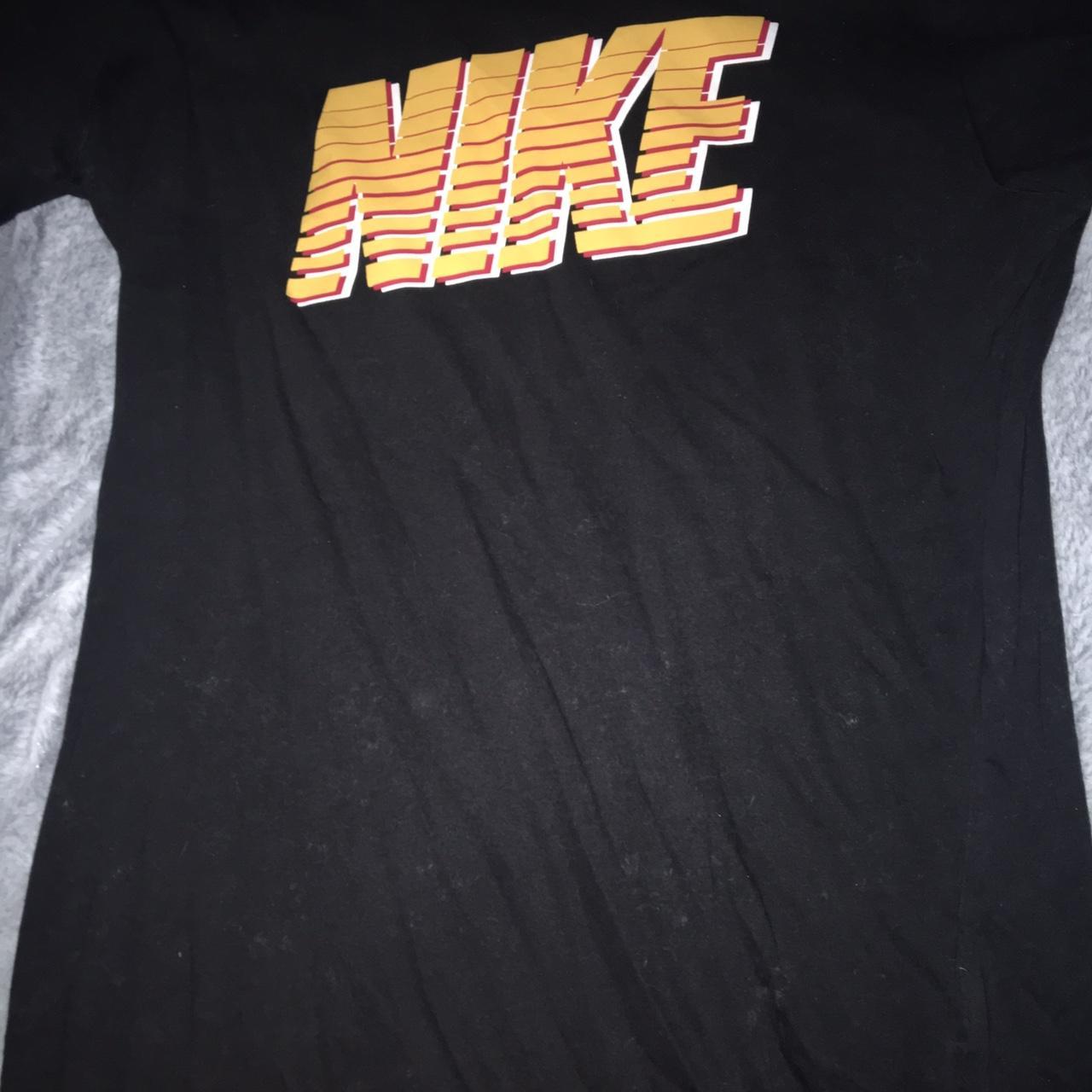 nike shirt with gold letters