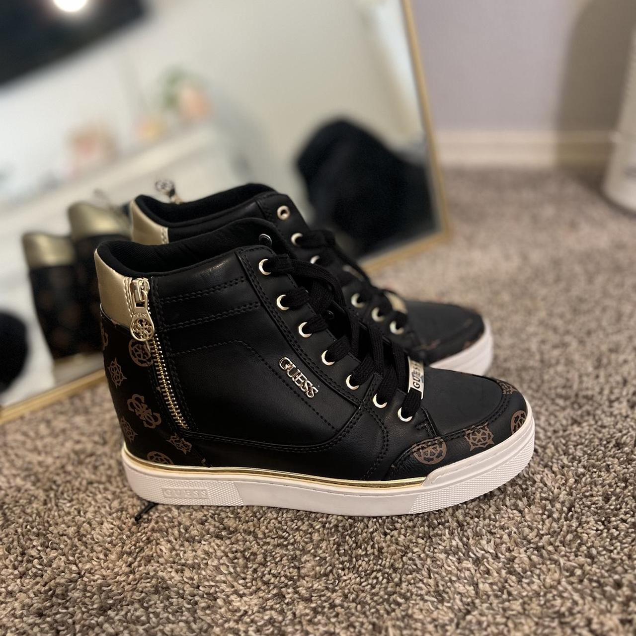 Guess black and gold sales trainers