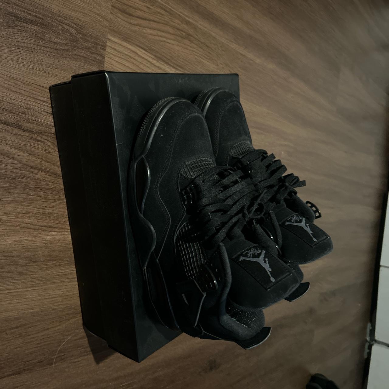 mens black cat 4s
