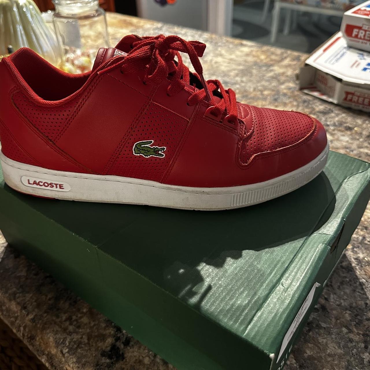 Red lacoste best sale trainers