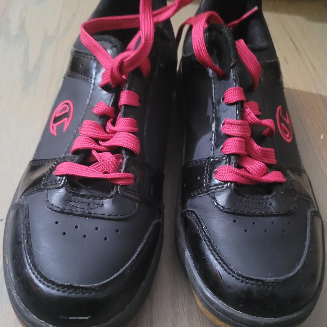 Black and store pink champion shoes