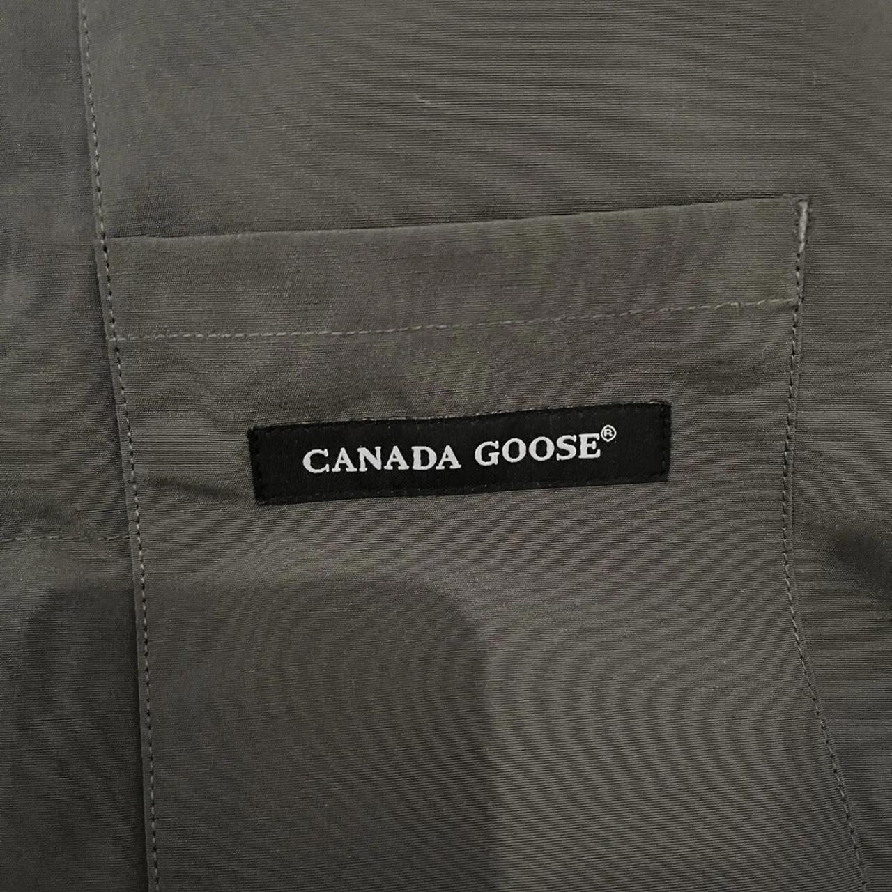 grey Canada Goose gilet with black badge. Excellent... - Depop