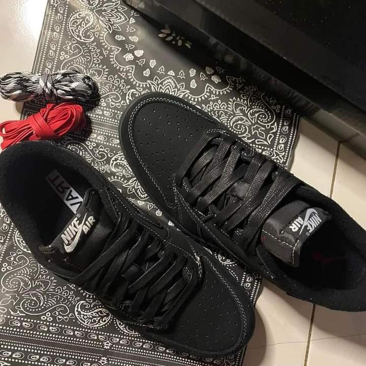 triple black jordan 1s