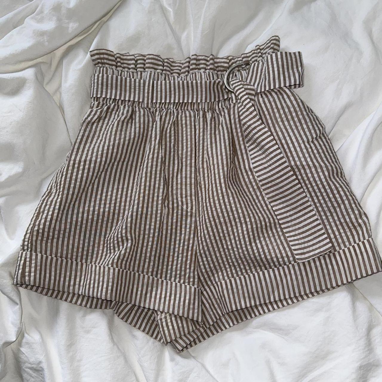 Super cute white and nude striped linen shorts have... - Depop