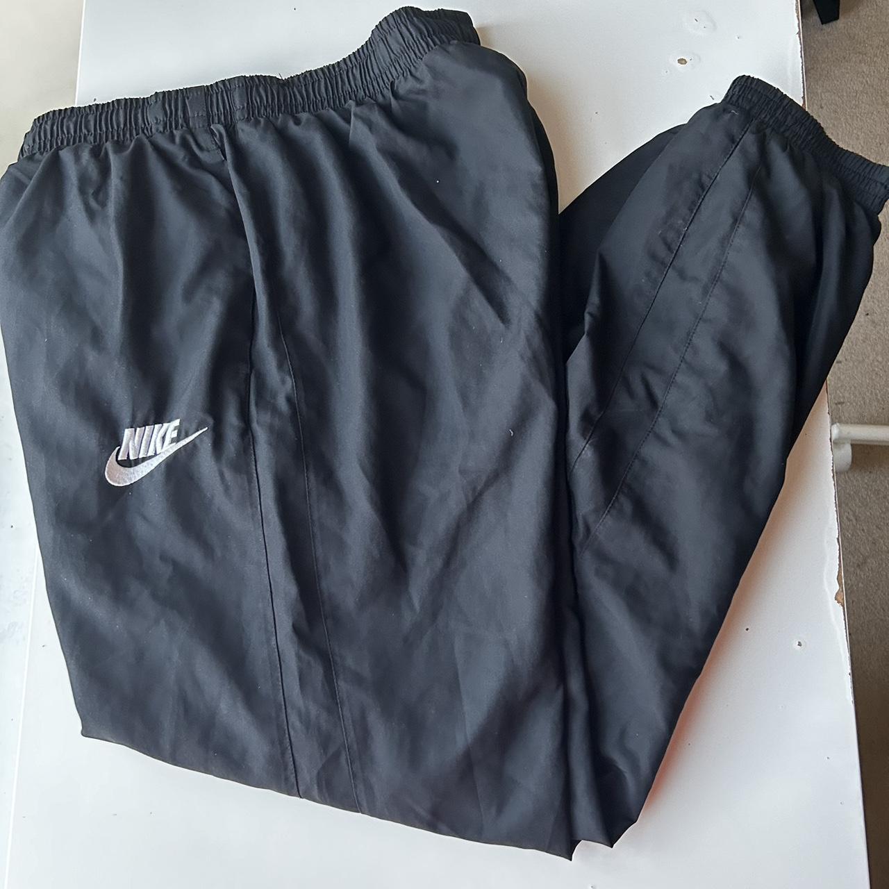 nike tracksuit bottoms medium
