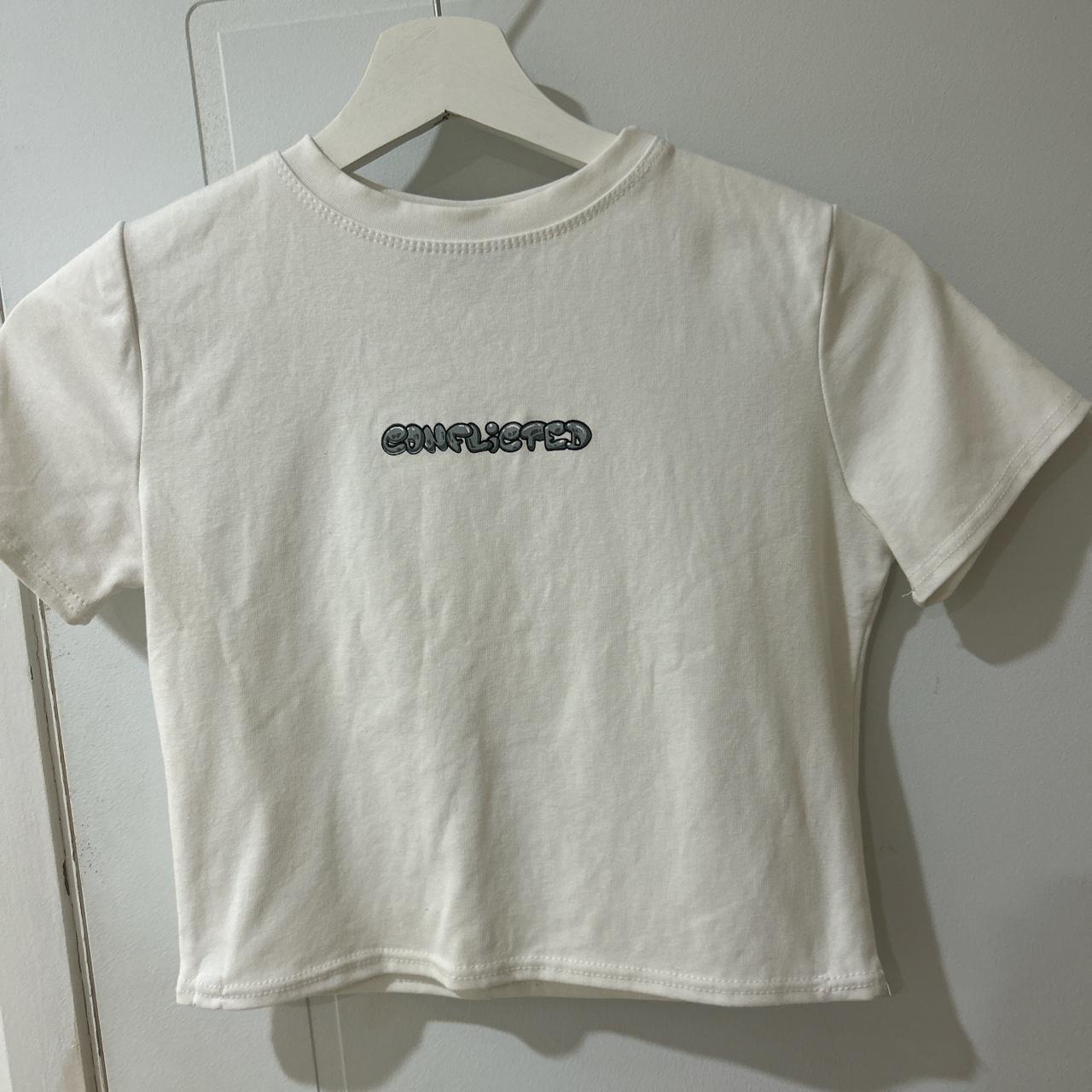 Y2K baby tee: conflicted - Depop