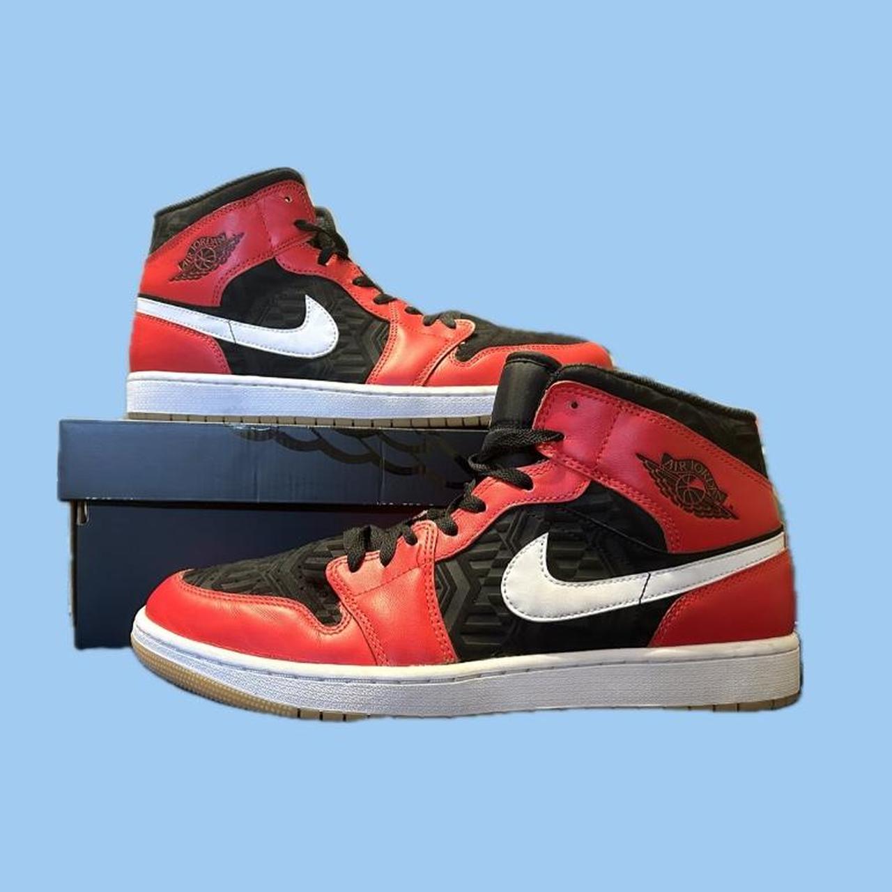 half black half red jordan ones