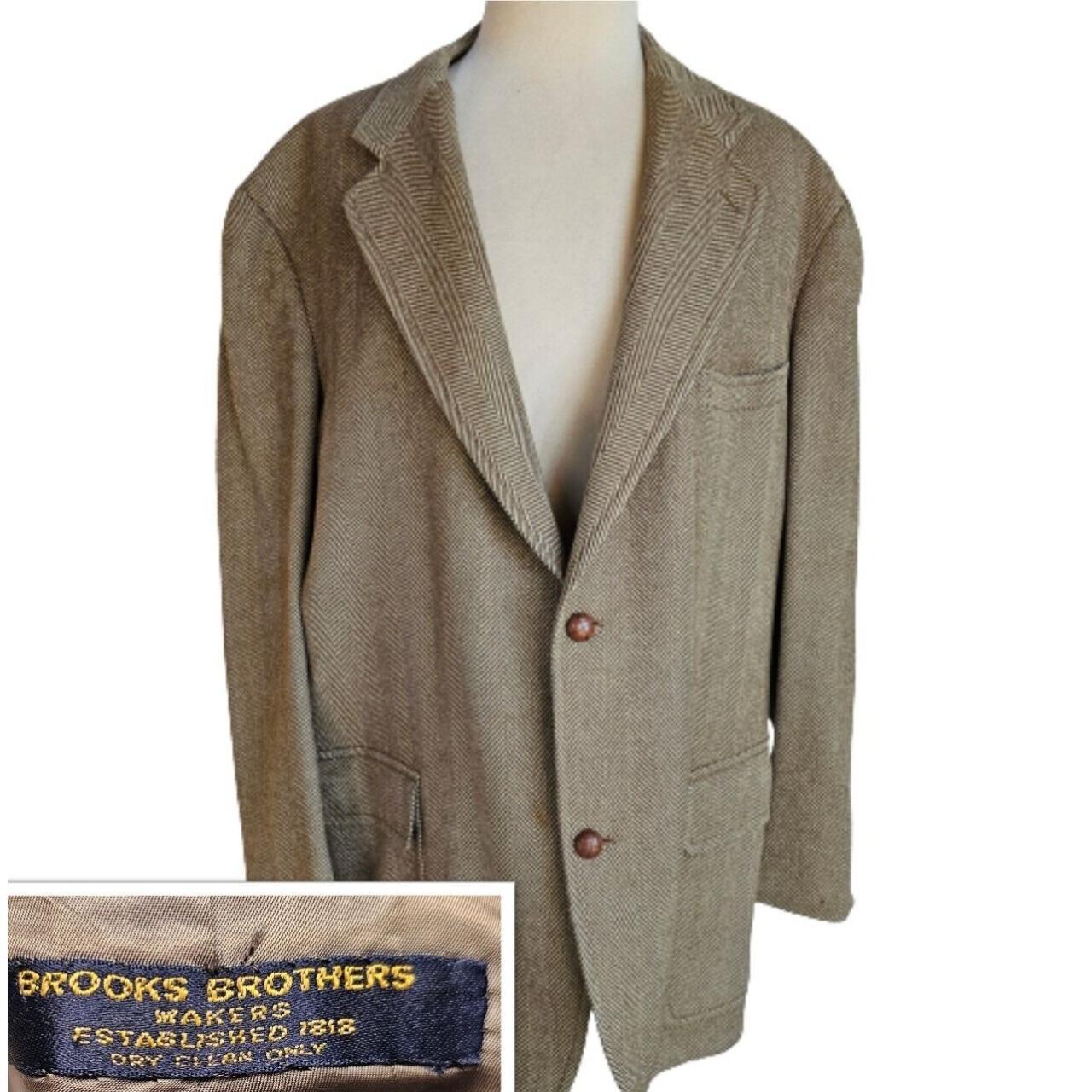 This vintage Brooks Brothers Makers suit jacket is...