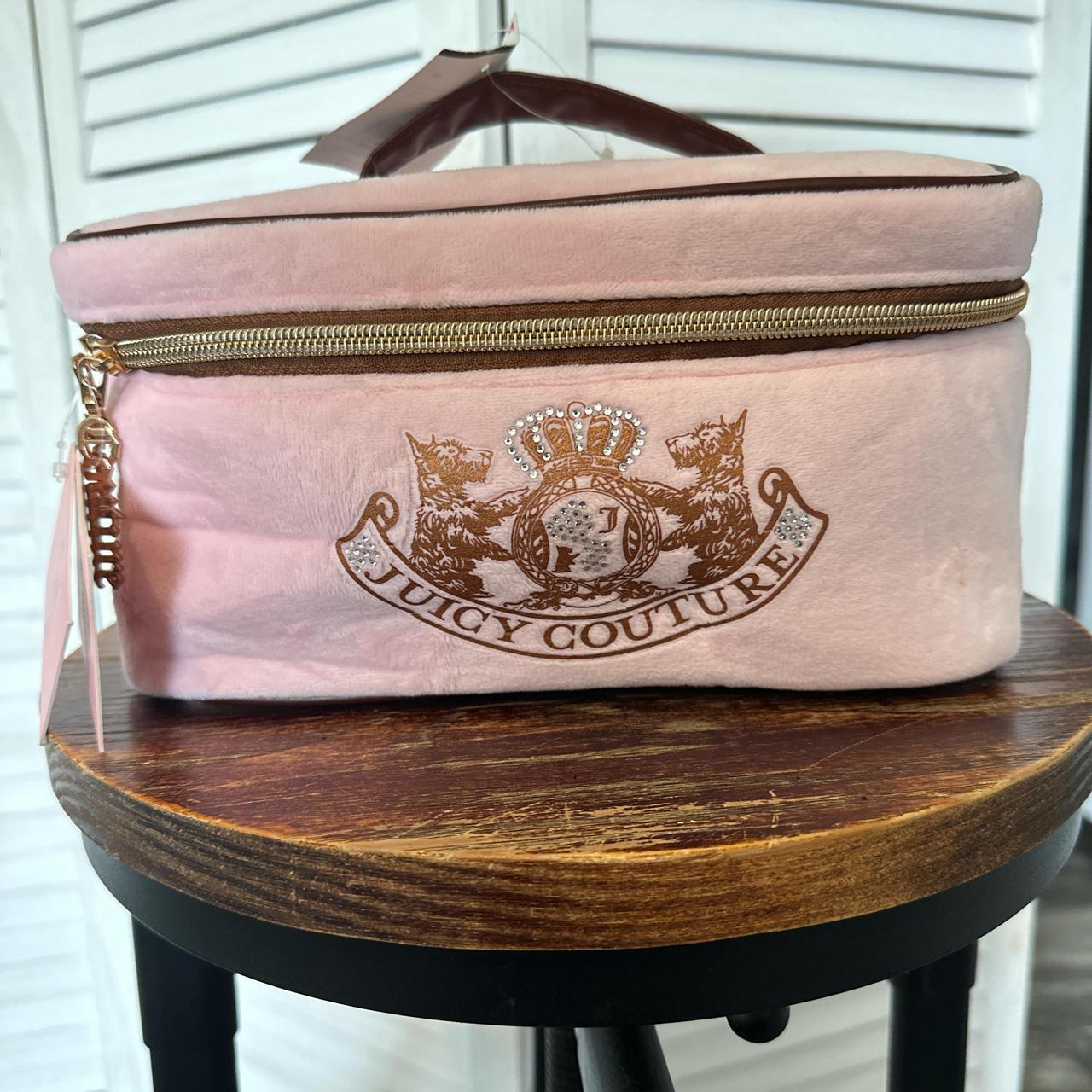 Juicy Couture pink makeup bag with a cute design