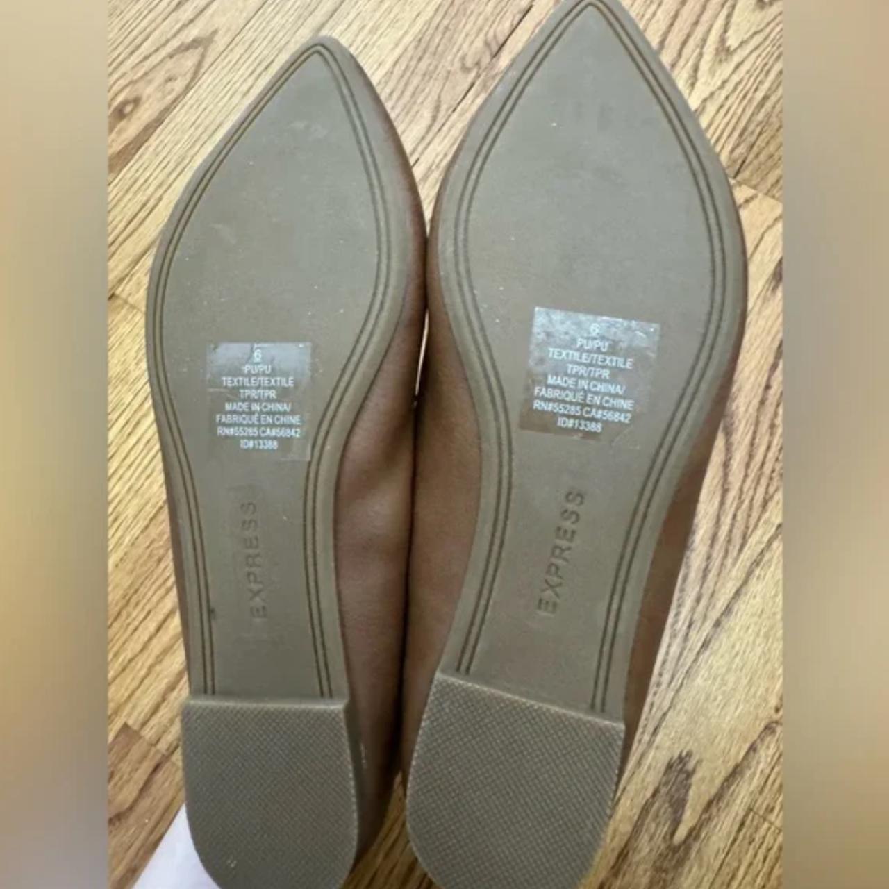Women’s brown pointed toe flats from Express, never... Depop