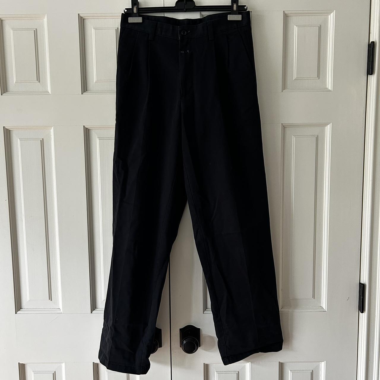 Black pleated trousers, small paint stain but... - Depop