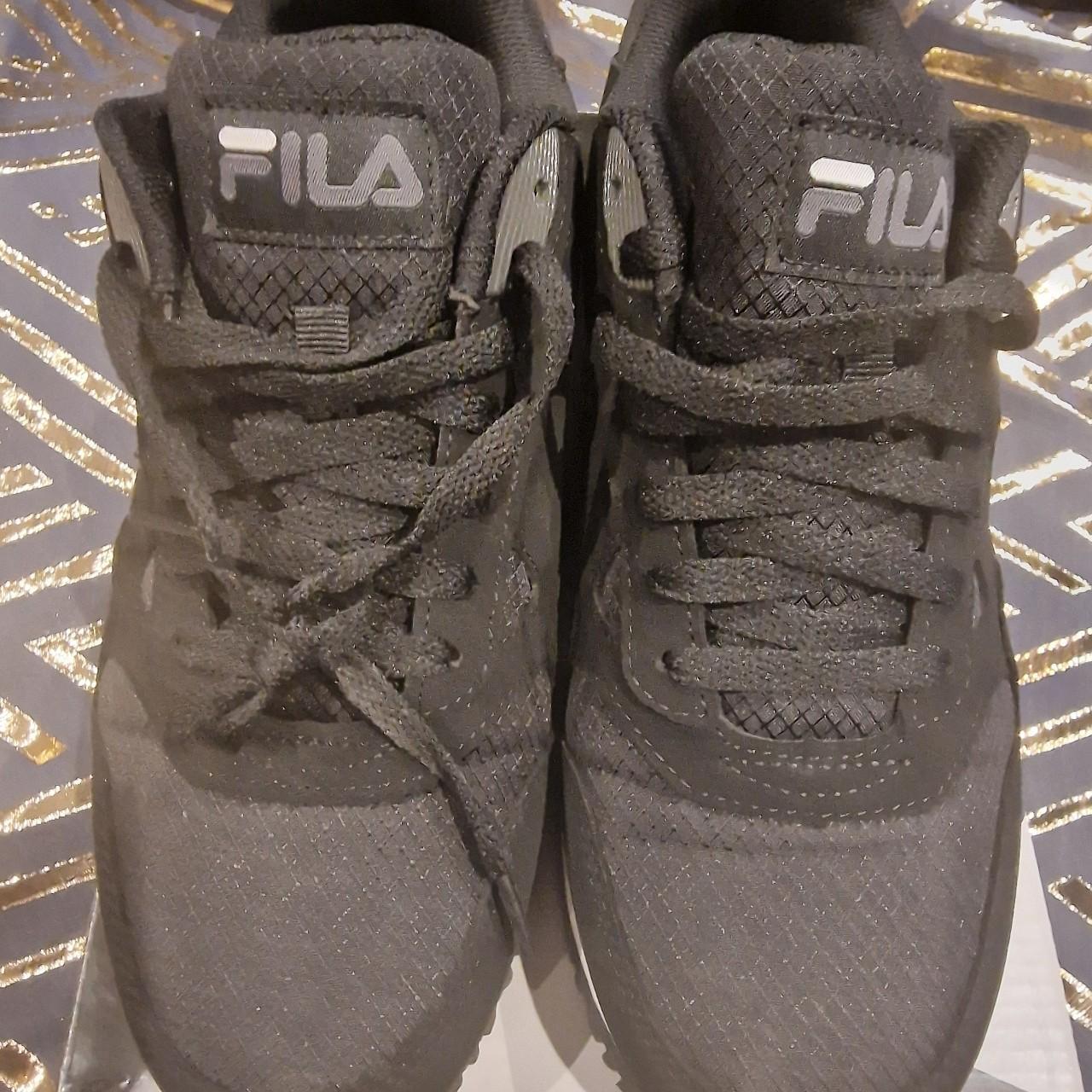 Black fila trainers - Depop