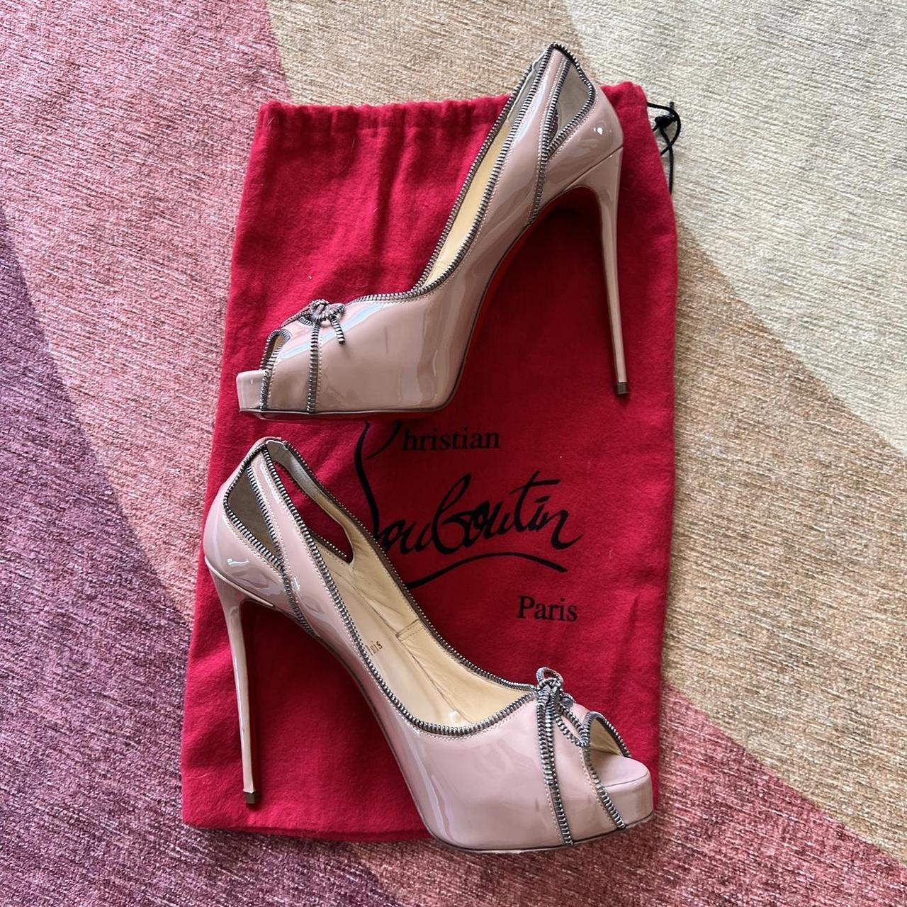 Christian Louboutin zipper heels worn once small