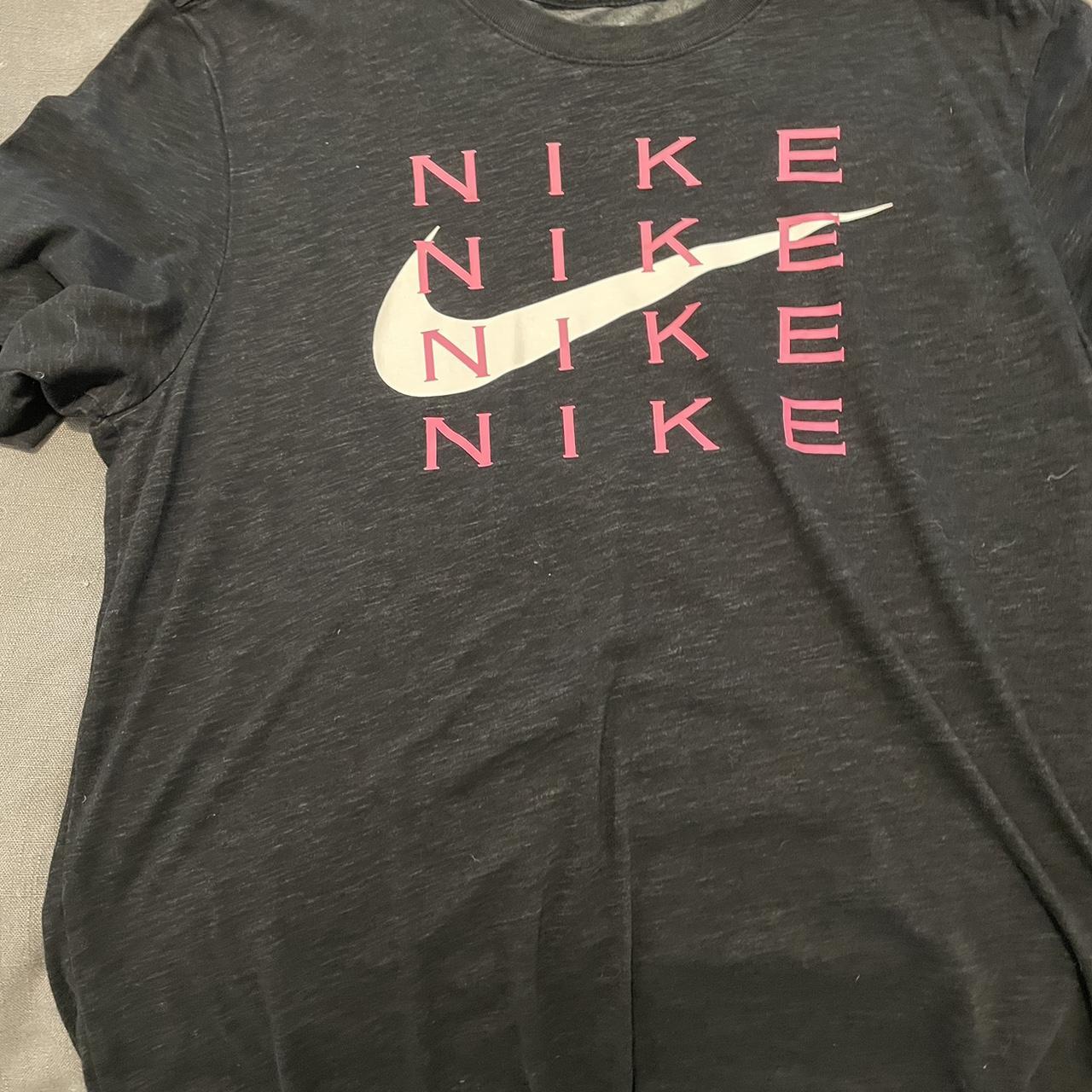 black and fuchsia nike shirt
