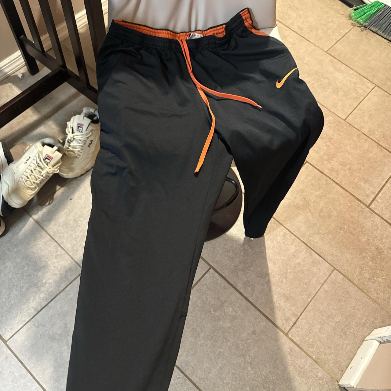 Nike track pants Size L So comfy Orange stripe Depop