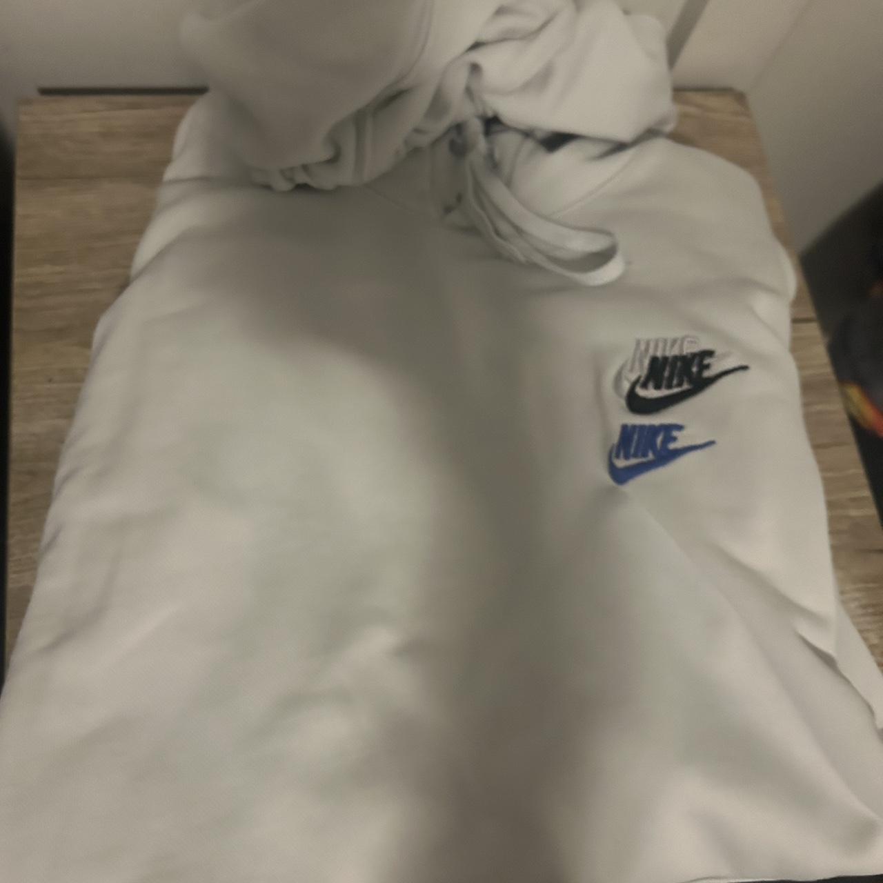 white nike yellow tick
