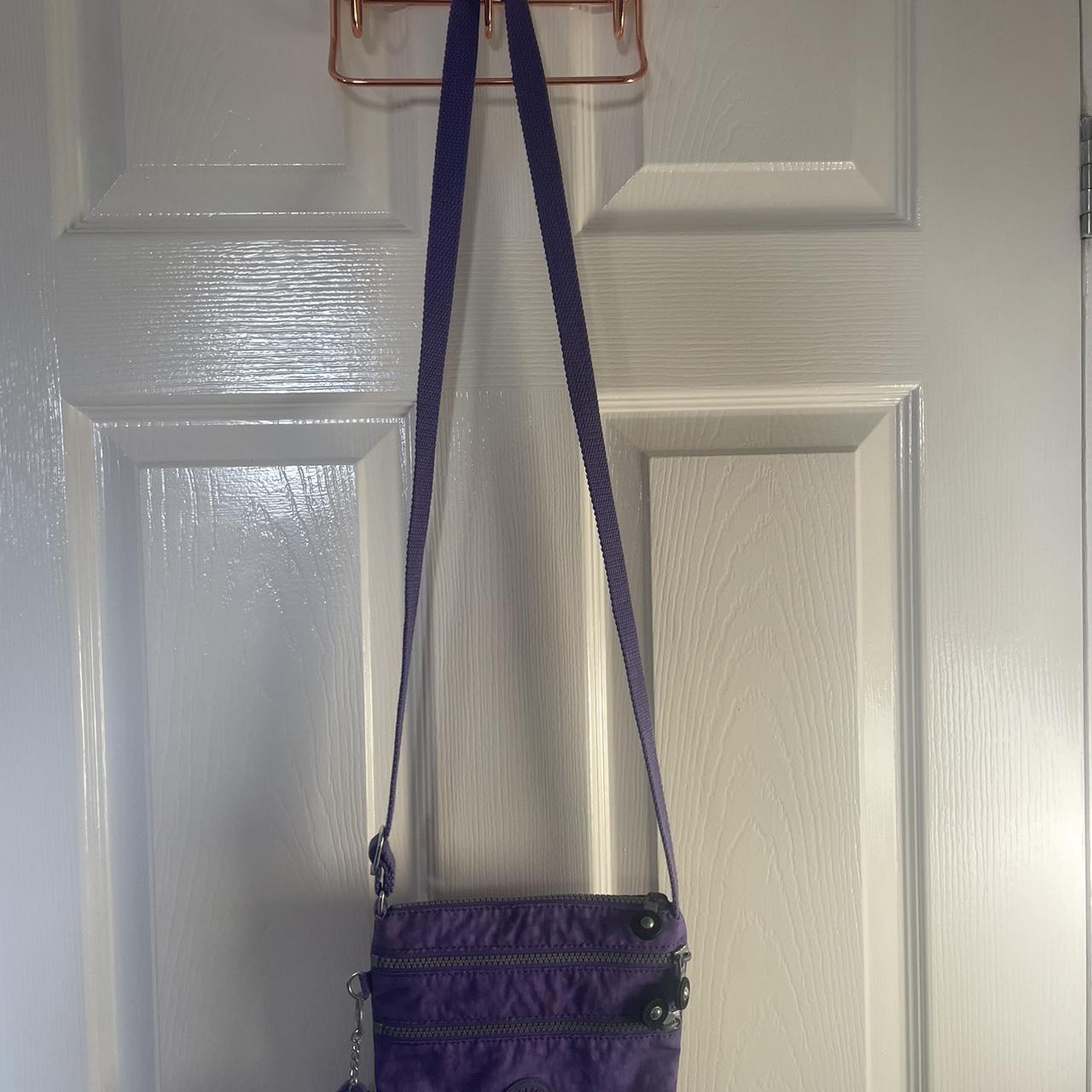 Purple small Kipling bag with an adjustable strap.... - Depop