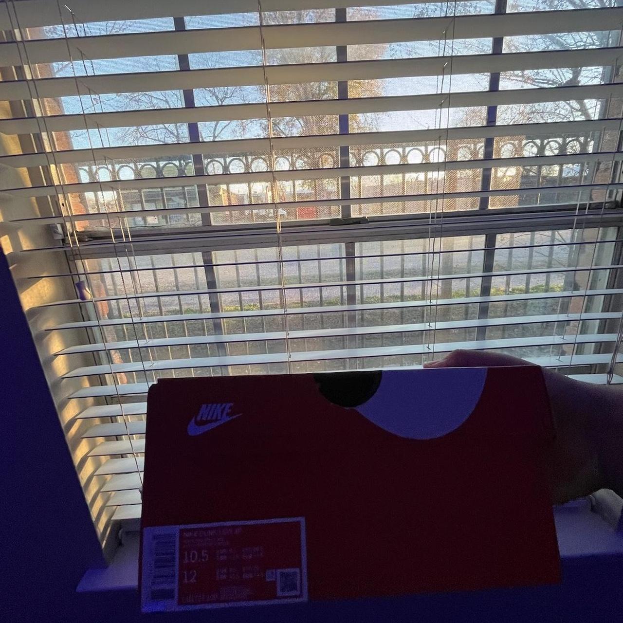 mens nike dunk low university red stores