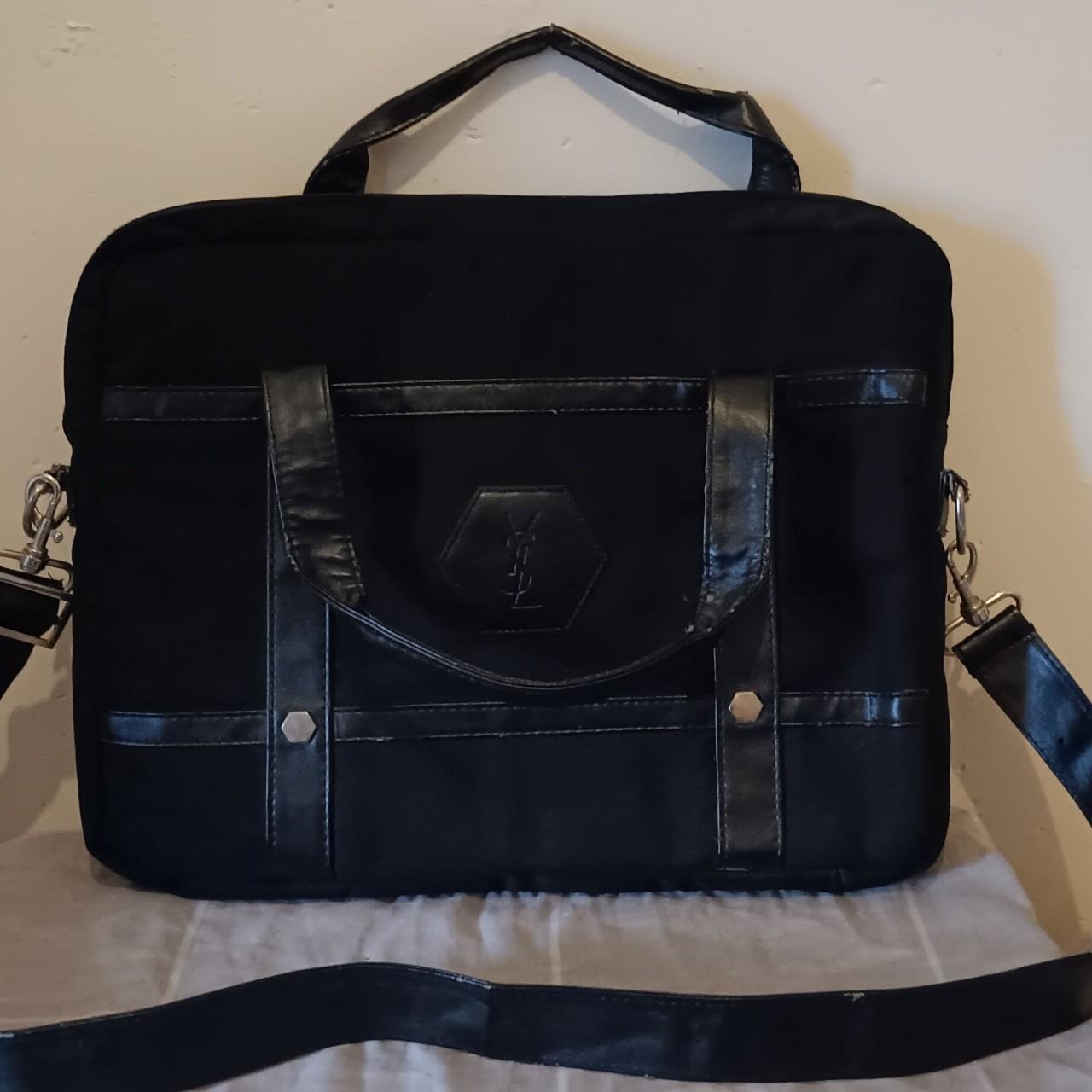 yves saint laurent laptop bag abit of wear on... - Depop