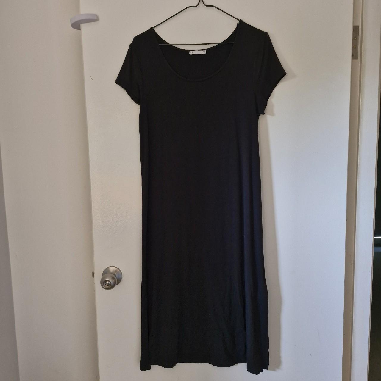 Target black midi dress sz 12. Made of stretchy. Depop