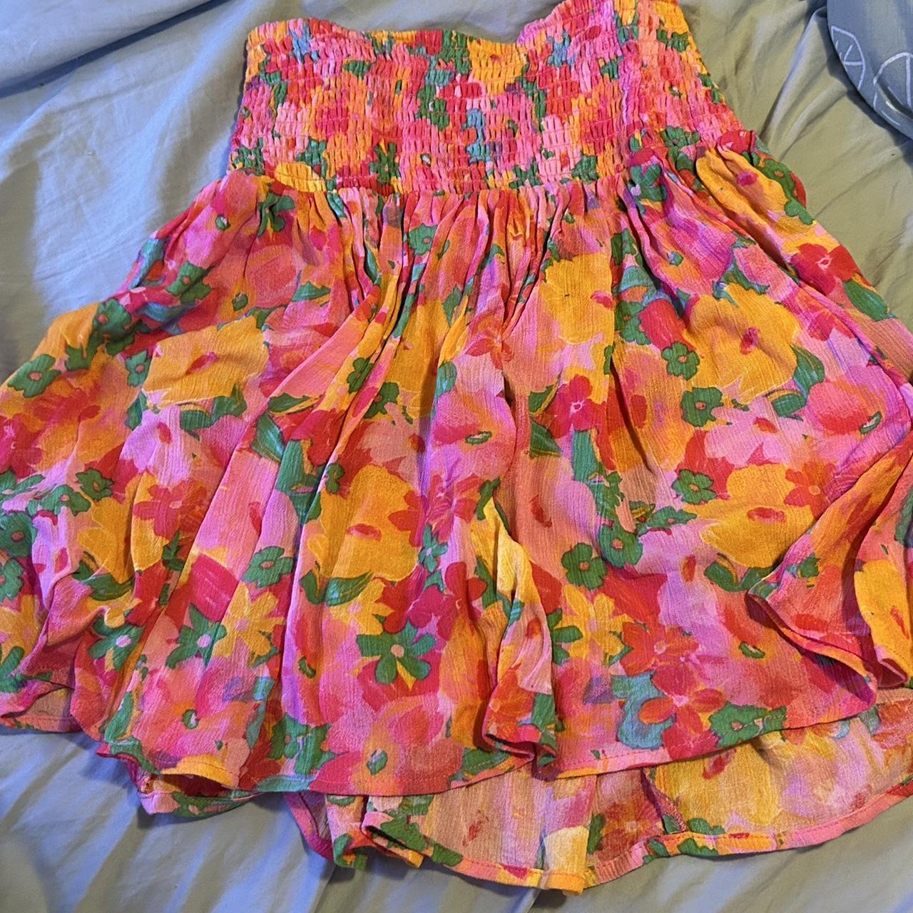 Pink green orange and blue floral skirt Got it. Depop