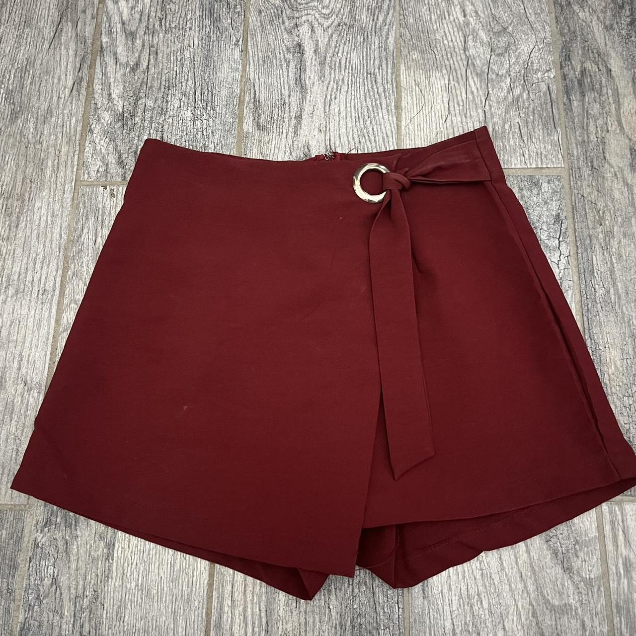 Maroon skort with silver details! Super cute