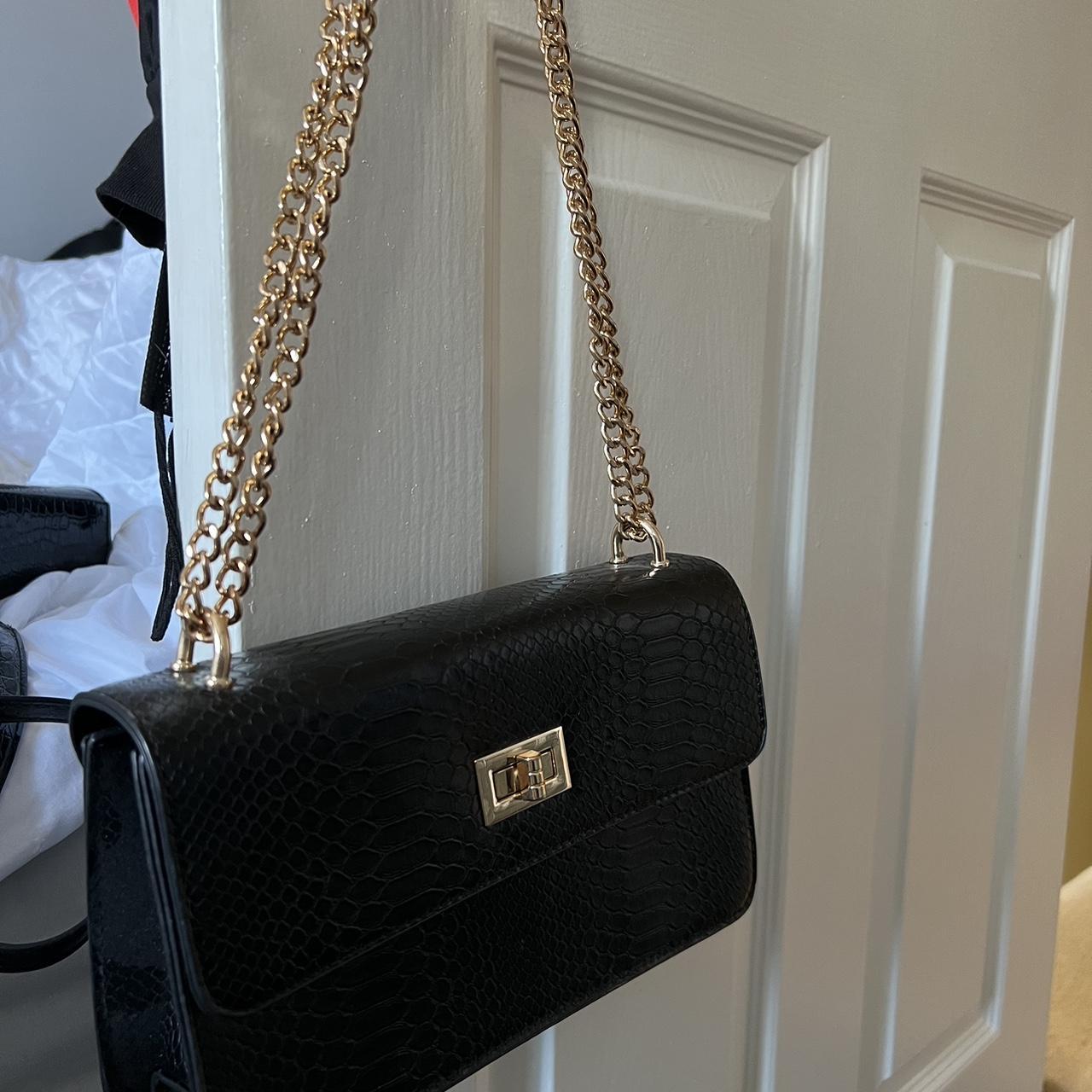 Black cross body gold chain bag. Not sure where it’s... - Depop