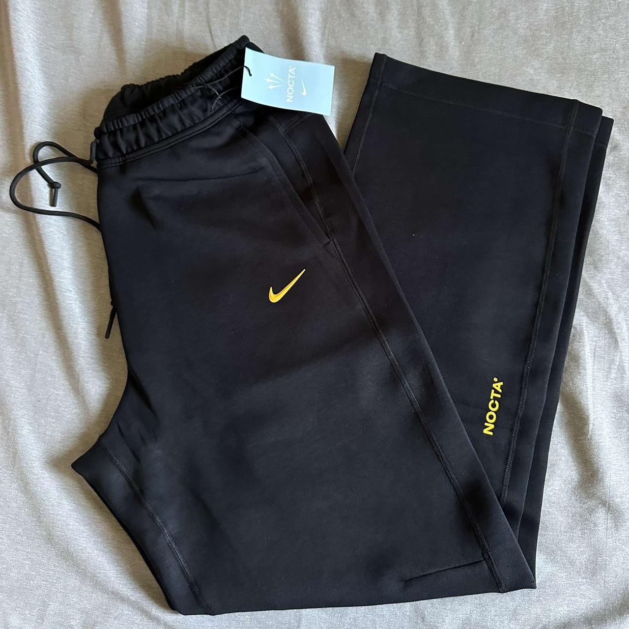 Black and sale yellow nike sweatpants