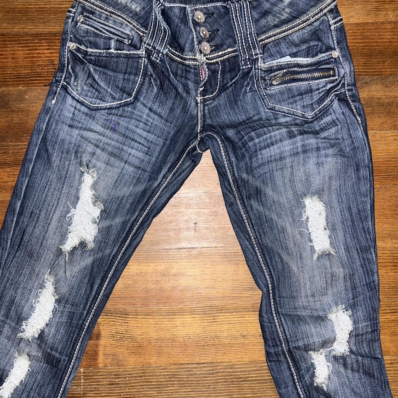 navy distressed low rise bootcut jeans almost... Depop