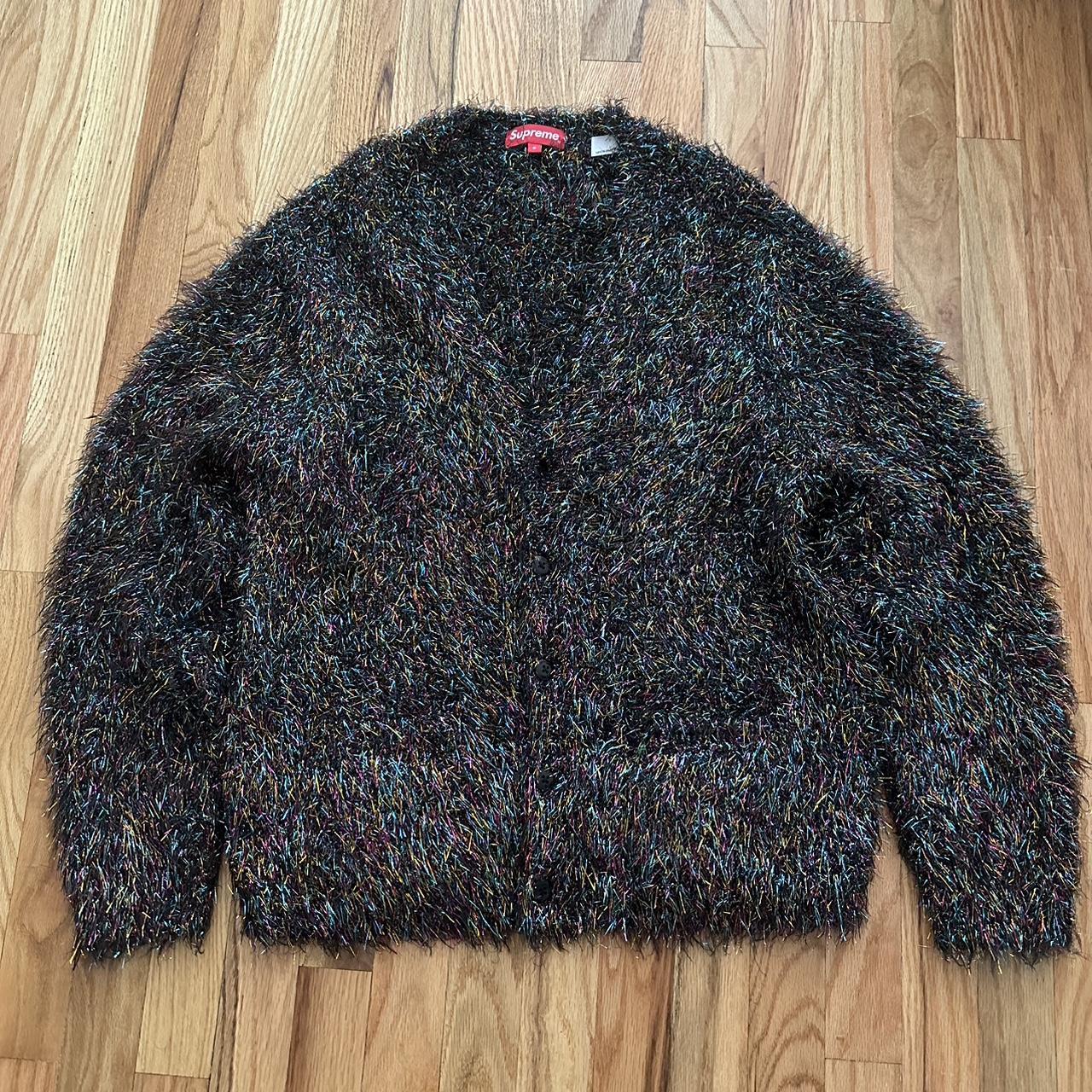 SUPREME SPARKLE SWEATER, Tremaine Emory’s first...