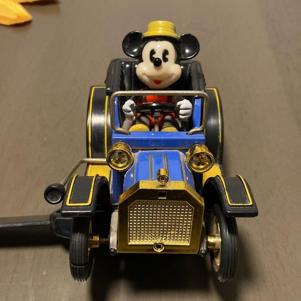 Walt Disney Mickey Mouse Vintage Masudaya top Tin Car . Original from Disney Parks 1981.