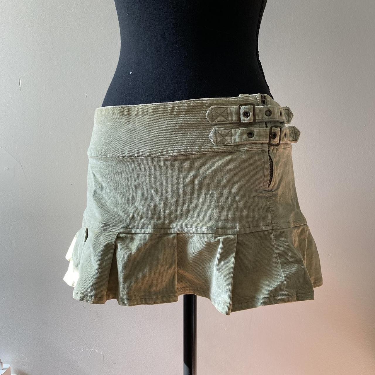 mint green pleated mini skirt, buckles are velcro... - Depop