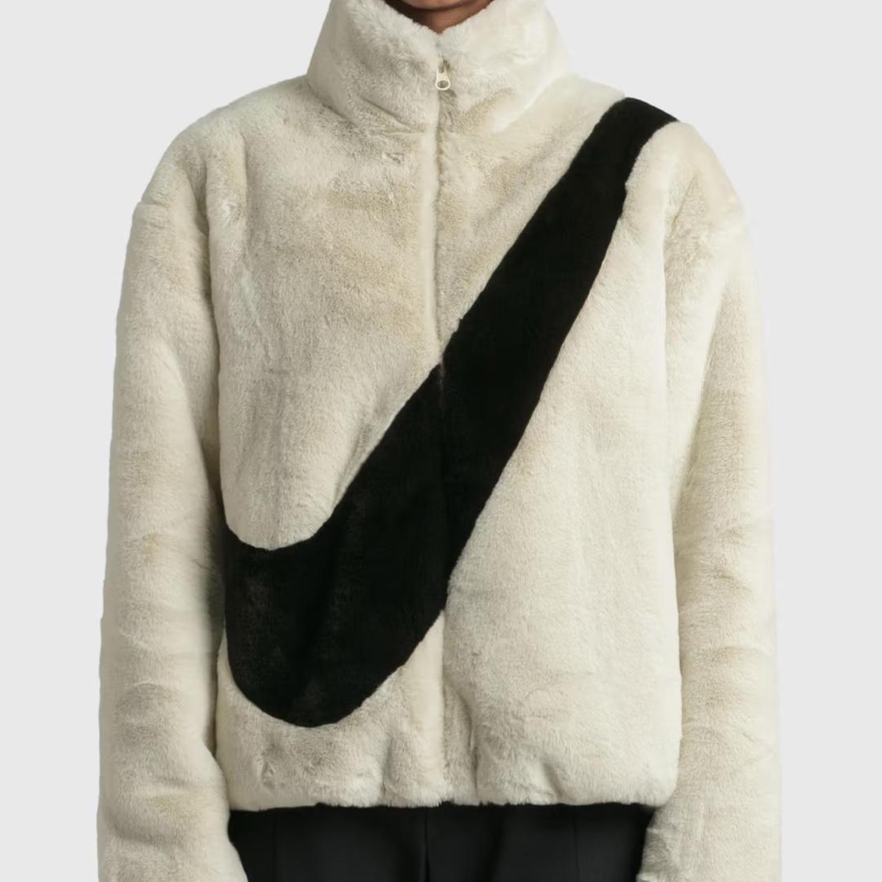 nike faux fur oversized swoosh jacket in cream