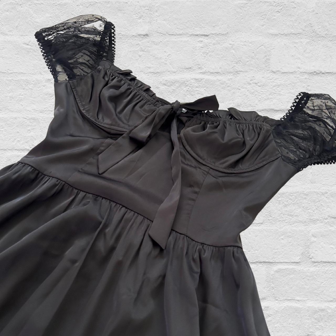 Dolls Kill black dress with mesh sleeves and tie in... Depop