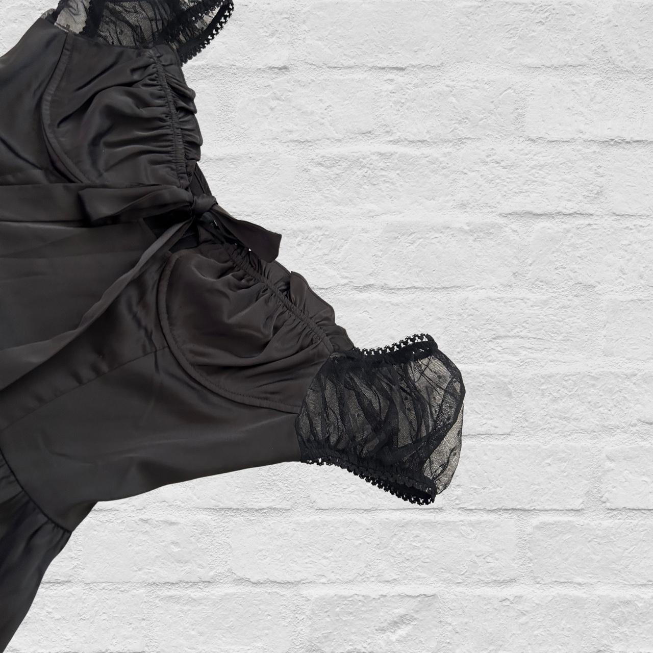 Dolls Kill black dress with mesh sleeves and tie in... Depop