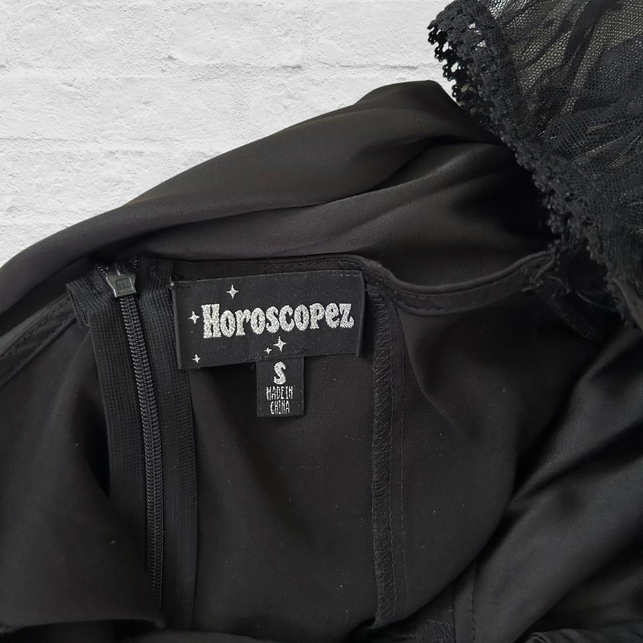 Dolls Kill black dress with mesh sleeves and tie in... Depop