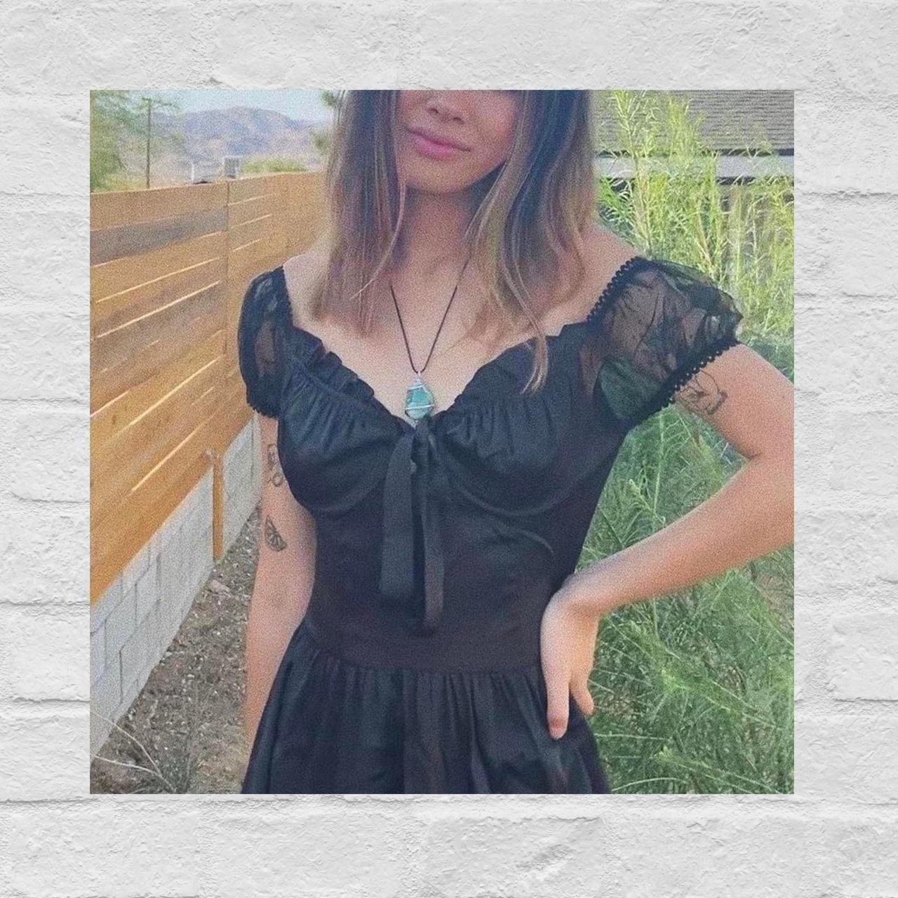 Dolls Kill black dress with mesh sleeves and tie in... Depop