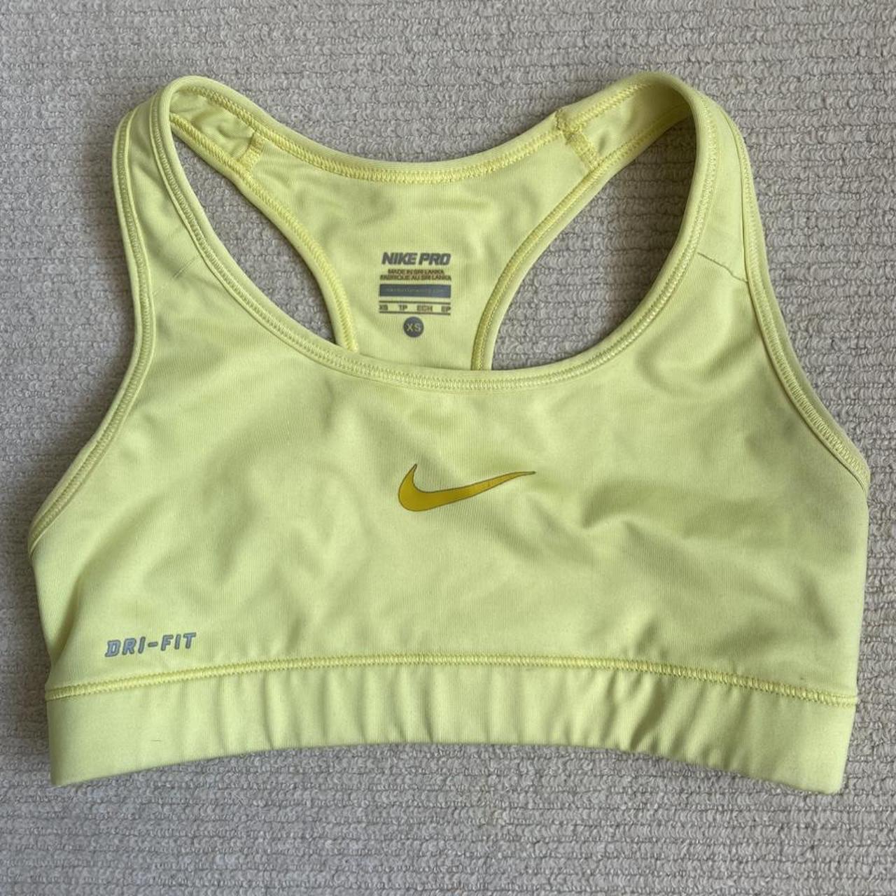 nike pink and yellow sports bra
