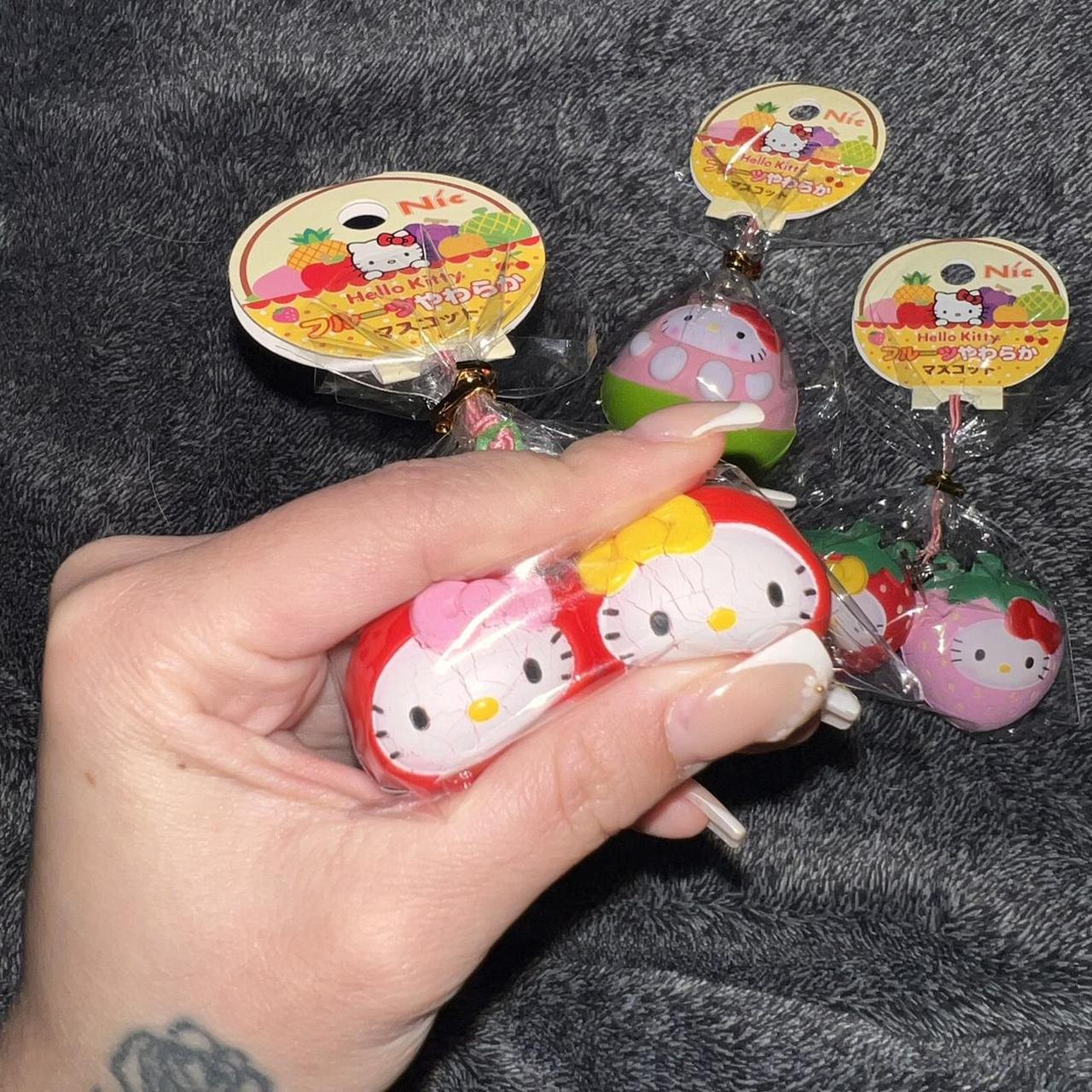 RARE HELLOW KITTY FRUIT SQUISHIES - defects shown -... - Depop