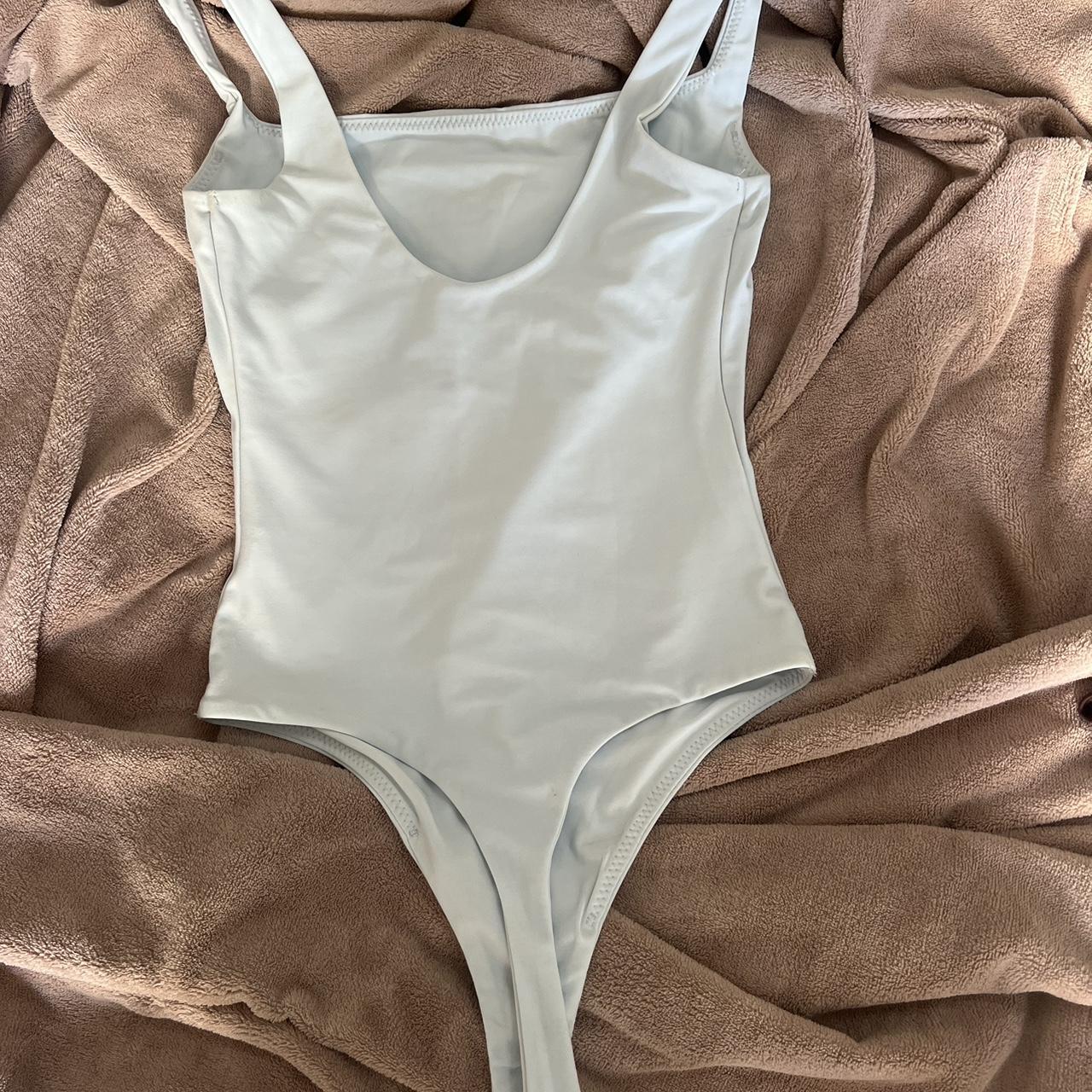 glassons bodysuit in baby blue. is in good condition... - Depop