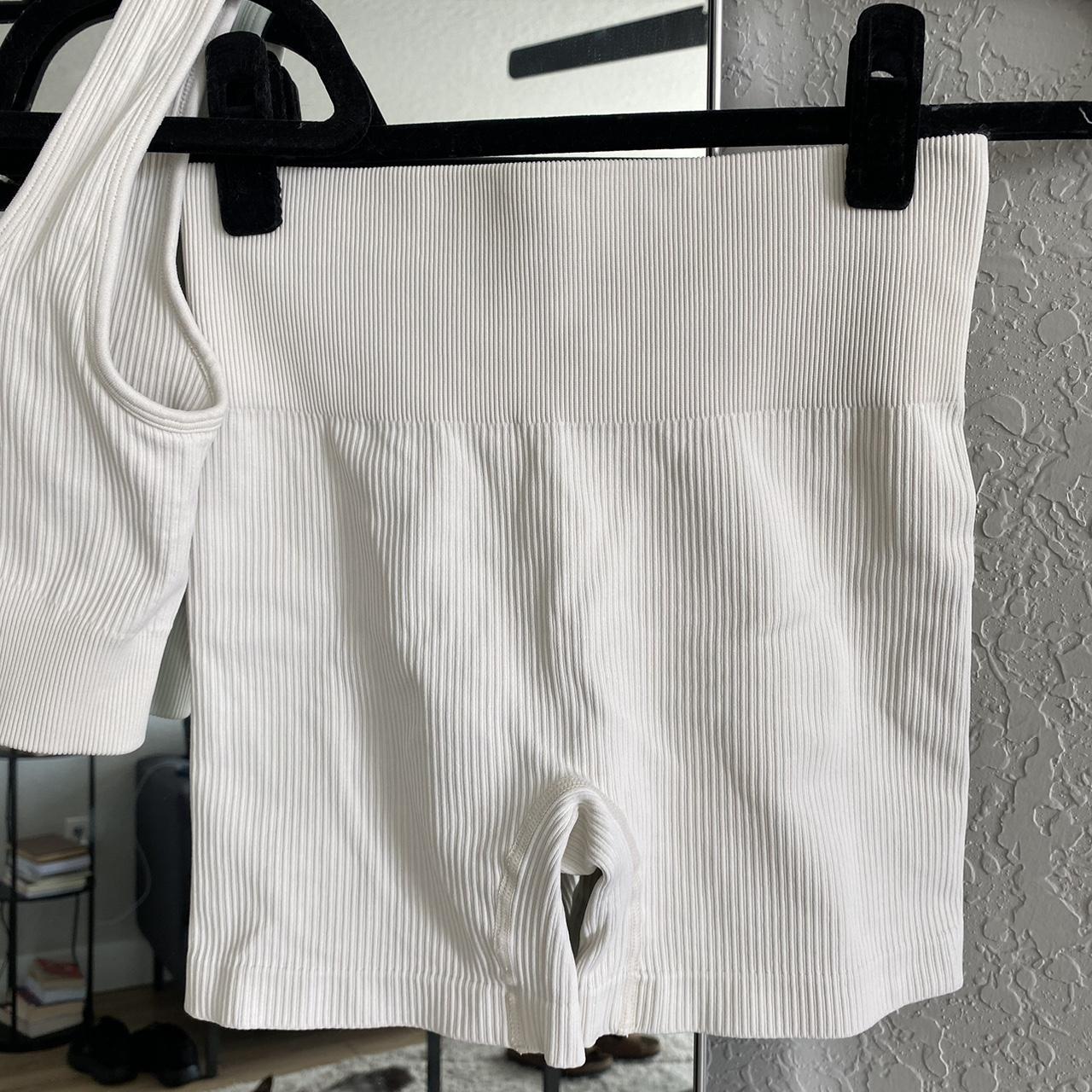 cream workout set top and bottom size... Depop