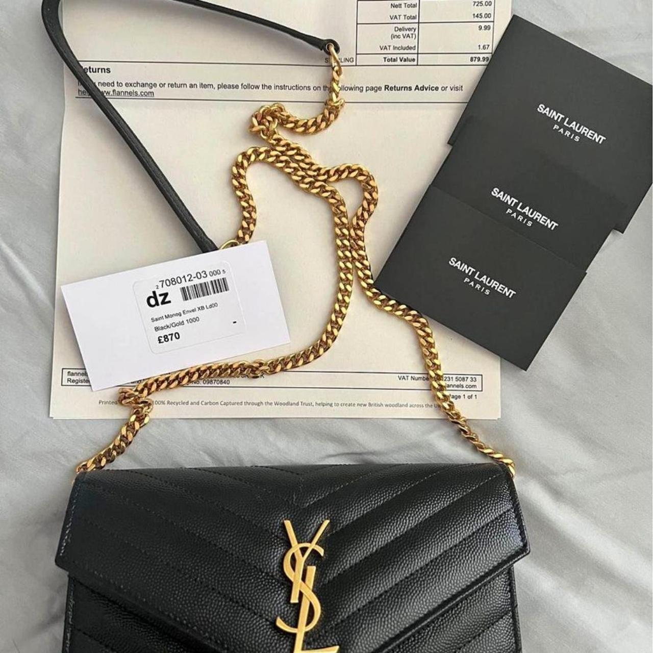 Ysl wristlet hot sale