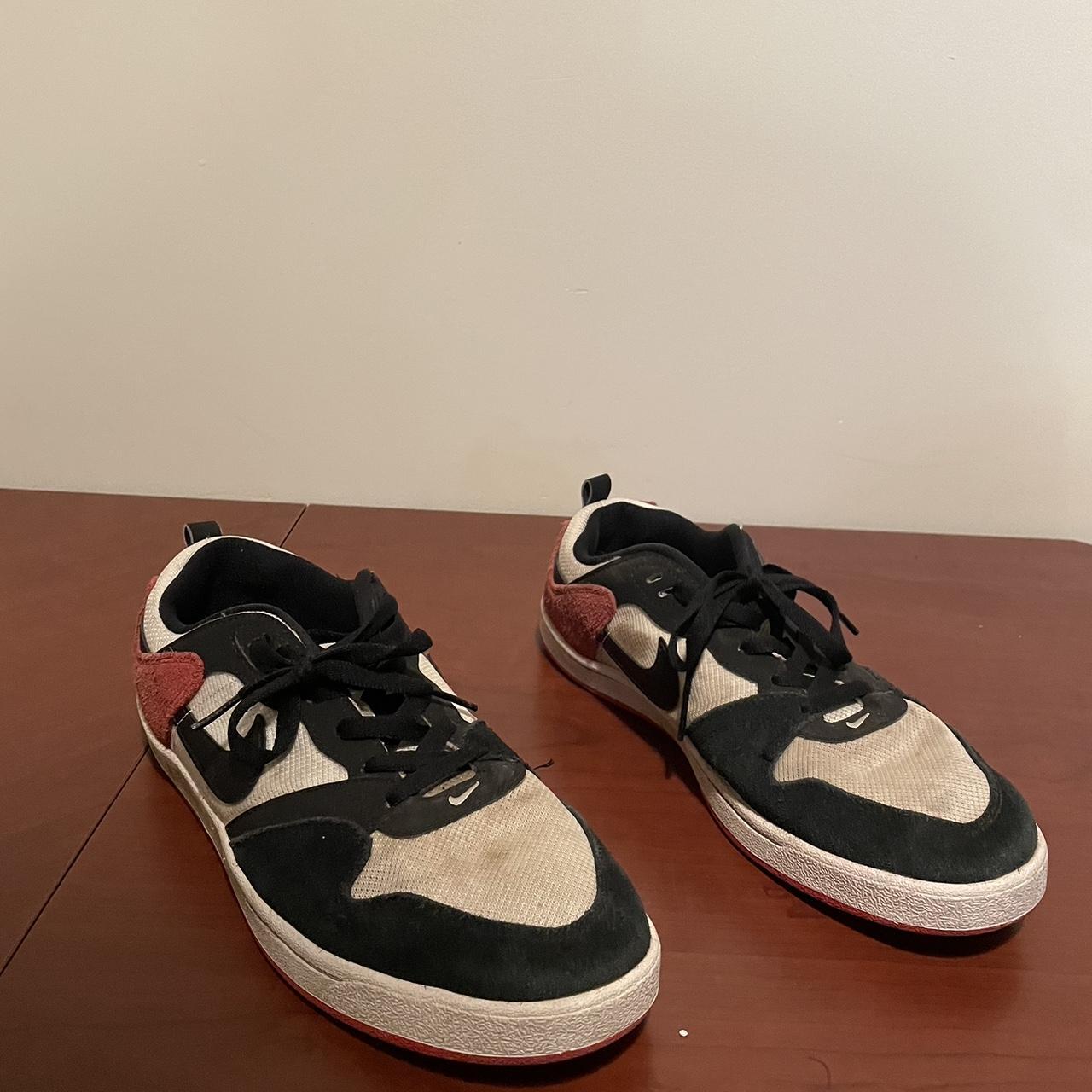 half red half white nike shoes