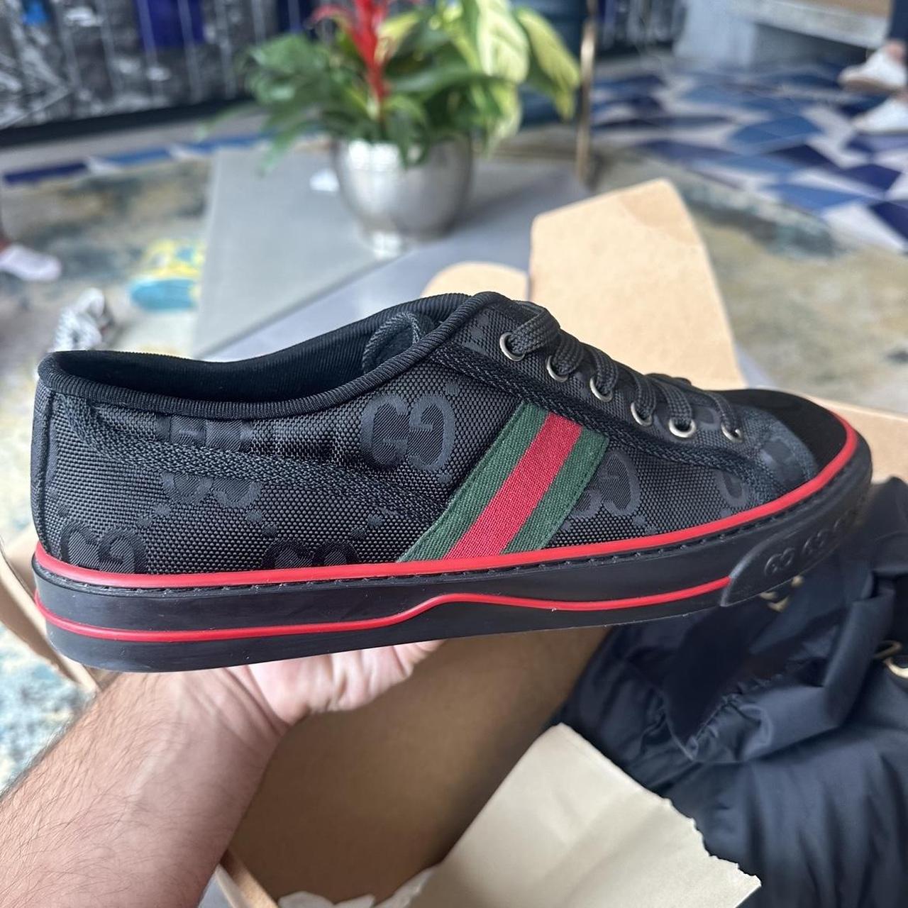 Make a bold statement with these black Gucci Off