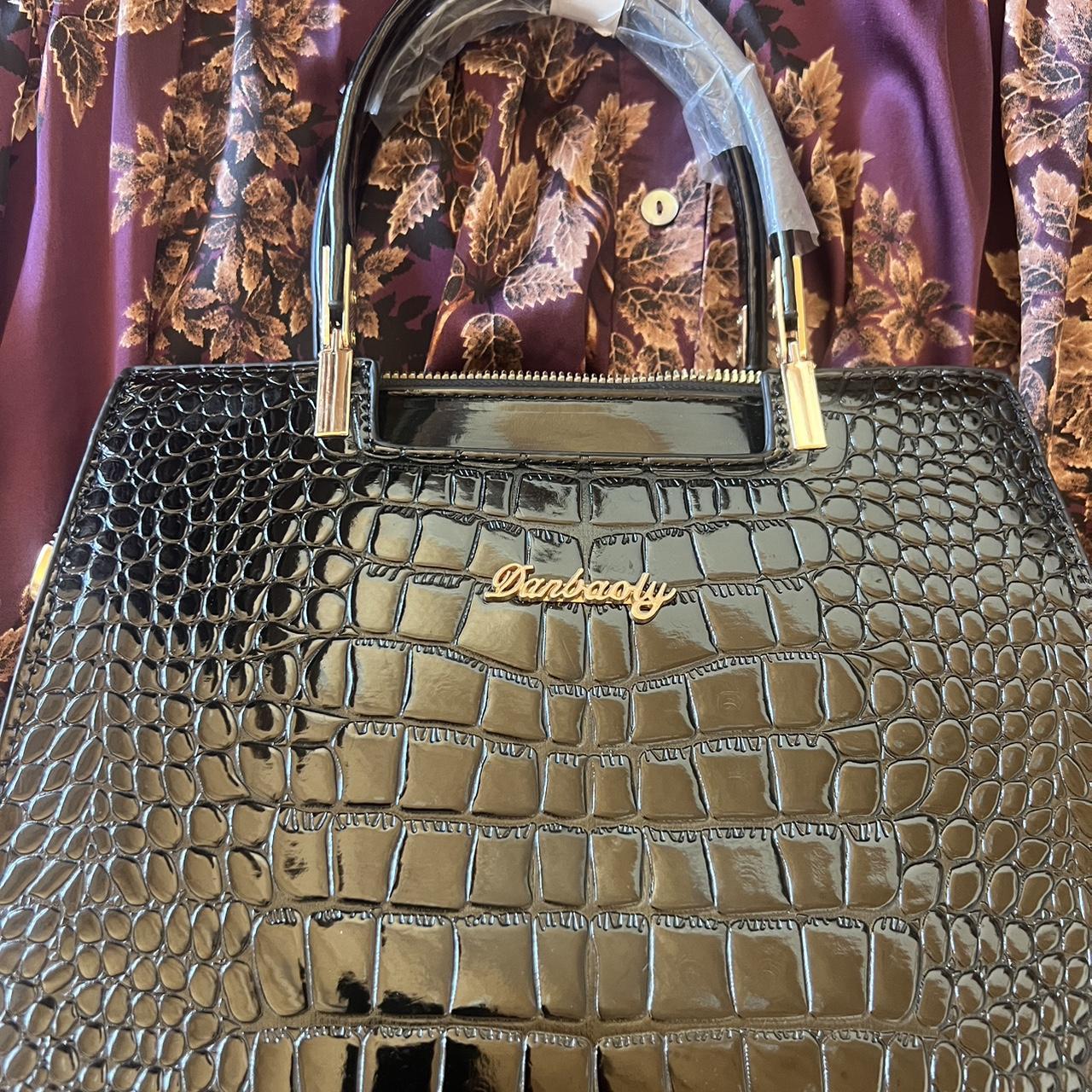 Danbaoly Black in color, beautiful Depop