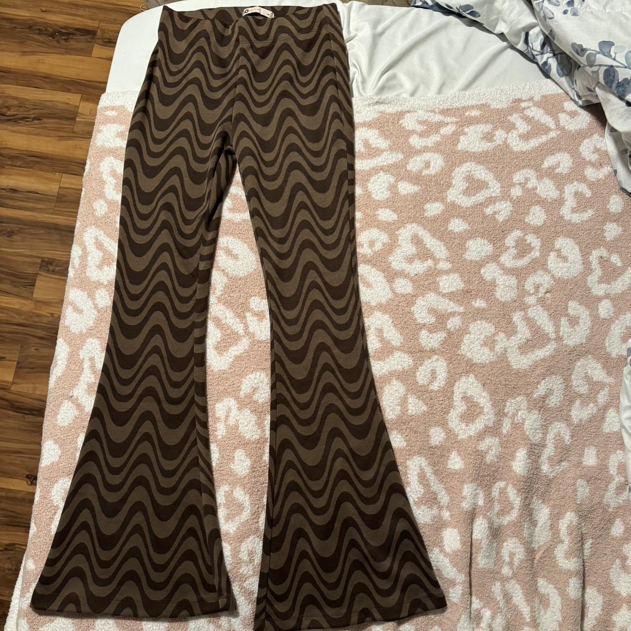 Brown high waisted flare pants. Size xs brand is - Depop