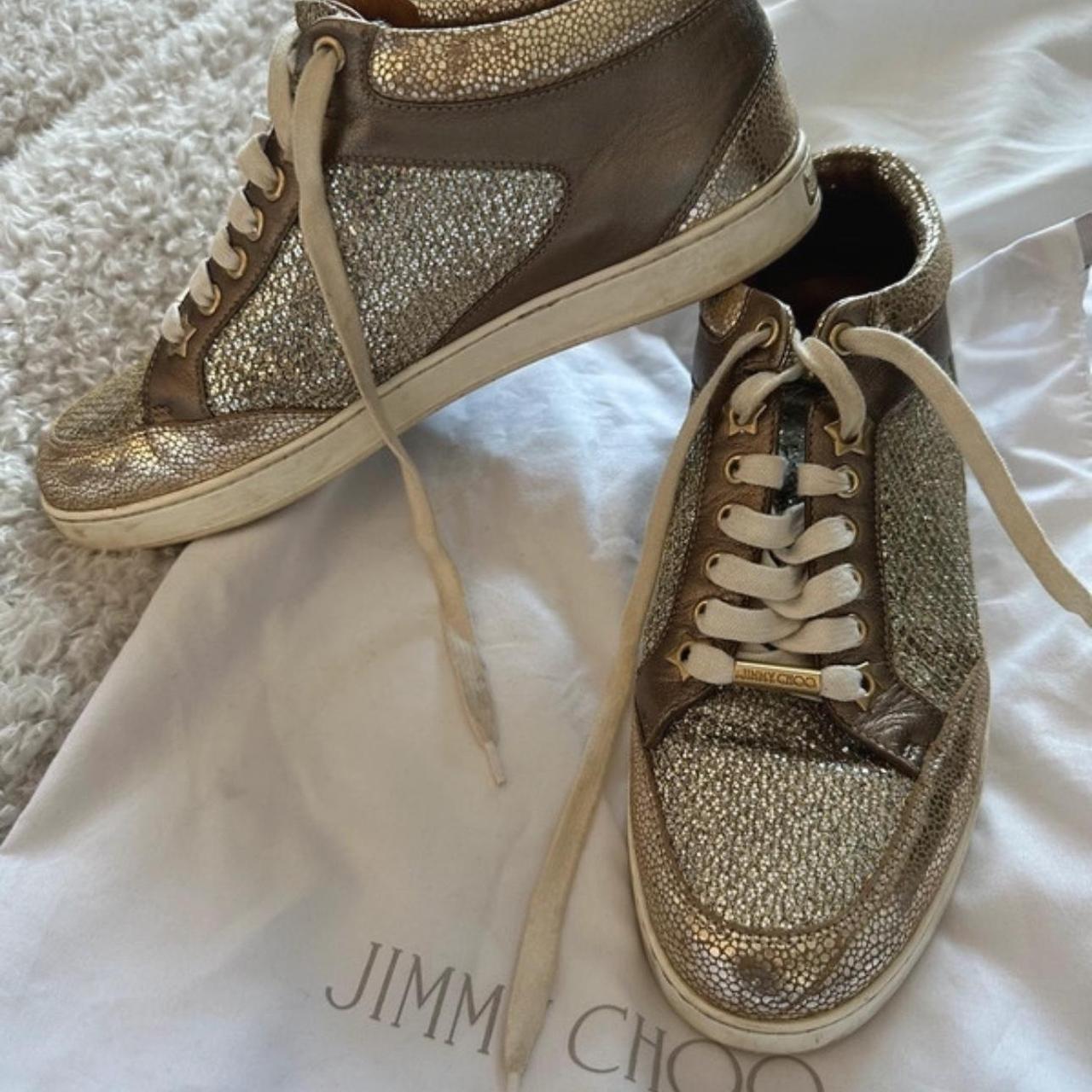 Gold jimmy choo trainers Used but still life left... - Depop